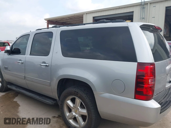 2013 Chevrolet Suburban LT with VIN 1GNSCJE03DR164477, listed as a IAAI auction lot 42083985 with 150,540 mi miles and . Bid and sale history available at DreamBid. Image 14.