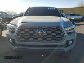 2023 Toyota Tacoma SR z VIN 3TMCZ5AN8PM619866, wystawiony jako Copart lot #48289915 z przebiegiem 17 547 mil mil oraz Szkoda całkowita • Salvage title. Historia ofert i sprzedaży dostępna na DreamBid. Obrazek 5.