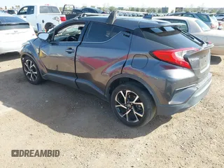 2019 Toyota C-HR XLE with VIN JTNKHMBX3K1018567, listed as a IAAI auction lot 41602932 with 213,386 mi miles and . Bid and sale history available at DreamBid. Image 3.