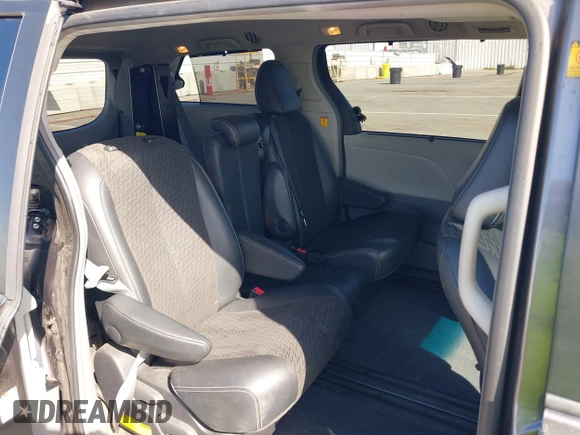 2012 Toyota Sienna SE with VIN 5TDXK3DCXCS233593, listed as a IAAI auction lot 41959611 with 85,558 mi miles. Bid and sale history available at carsss.com. Image 8.