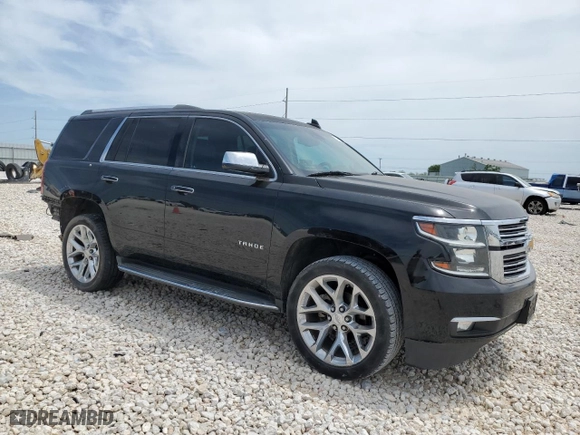 2017 Chevrolet Tahoe Premier with VIN 1GNSCCKC2HR193680, listed as a Copart auction lot 53711135 with 103,694 mi miles and Salvage Title. Bid and sale history available at carsss.com. Image 4.