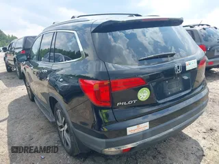 2017 Honda Pilot Touring with VIN 5FNYF5H99HB037126, listed as a IAAI auction lot 42275048 with 164,289 mi miles and . Bid and sale history available at DreamBid. Image 3.
