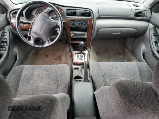 2000 Subaru Legacy with VIN 4S3BE6453Y7215569, listed as a Copart auction lot 81493564 with 218,045 mi miles and Salvage title. Bid and sale history available at DreamBid. Image 8.