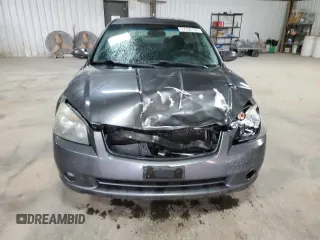 2005 Nissan Altima SE z VIN 1N4BL11D75C336375, wystawiony jako Copart lot #57359155 z przebiegiem 124 064 mil mil oraz Czysty tytuł • Clean title. Historia ofert i sprzedaży dostępna na DreamBid. Obrazek 5.