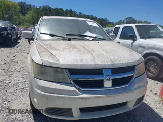 2009 Dodge Journey SXT with VIN 3D4GG57VX9T200489, listed as a IAAI auction lot 42048965 with 156,830 mi miles. Bid and sale history available at carsss.com. Image 6.
