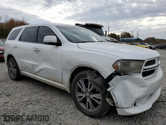 2013 Dodge Durango R/T with VIN 1C4SDHCT0DC648668, listed as a Copart auction lot 83211194 with 149,649 mi miles and Salvage title. Bid and sale history available at DreamBid. Image 4.