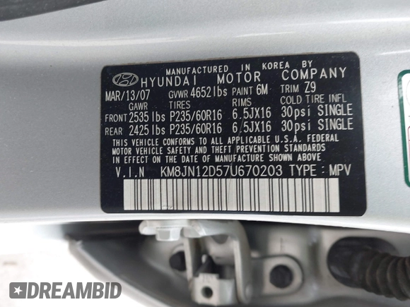 2007 Hyundai Tucson SE with VIN KM8JN12D57U670203, listed as a IAAI auction lot 41619422 with 92,450 mi miles. Bid and sale history available at carsss.com. Image 9.