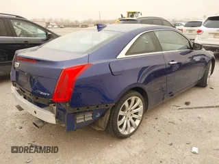2015 Cadillac ATS Luxury AWD z VIN 1G6AH1RX6F0120173, wystawiony jako IAAI lot #41701867 z przebiegiem 70 142 mil mil oraz . Historia ofert i sprzedaży dostępna na DreamBid. Obrazek 4.