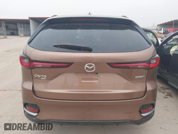 2025 Mazda CX-70 Premium Plus with VIN JM3KJEHA1S1111323, listed as a IAAI auction lot 42109316 with 561 mi miles and . Bid and sale history available at DreamBid. Image 17.