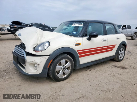 2015 MINI Hardtop 4 Door with VIN WMWXS5C51FT831167, listed as a Copart auction lot 52778685 with 52,770 mi miles and Salvage title. Bid and sale history available at DreamBid. Image 1.