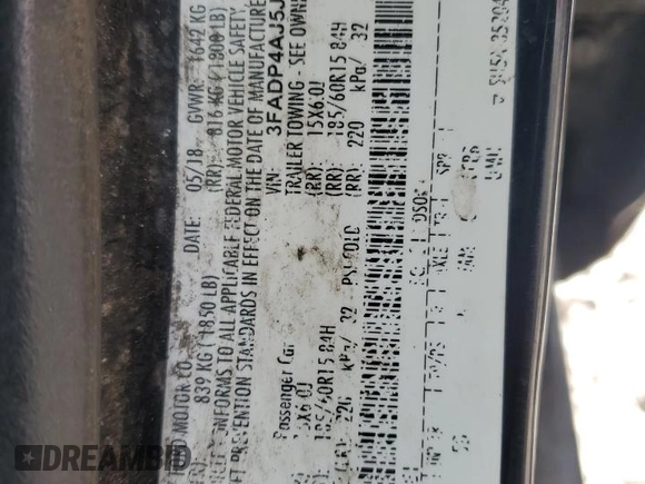 2018 Ford Fiesta S with VIN 3FADP4AJ5JM125950, listed as a Copart auction lot 61753035 with 136,414 mi miles and Salvage title. Bid and sale history available at DreamBid. Image 12.