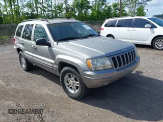 2000 Jeep Grand Cherokee Laredo with VIN 1J4G258S0YC274671, listed as a IAAI auction lot 42012699 with 301,853 mi miles and . Bid and sale history available at DreamBid. Image 1.