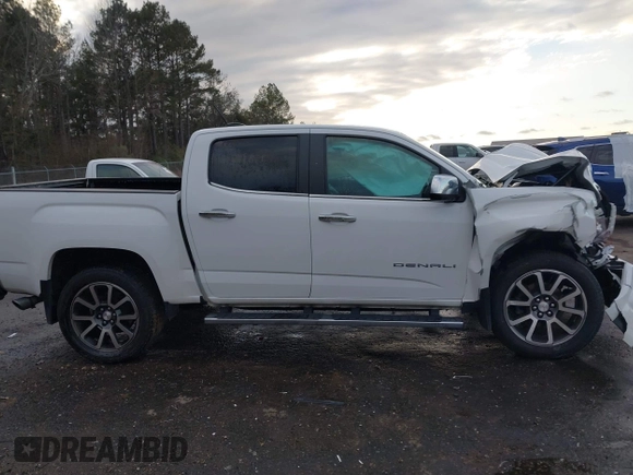 2021 GMC Canyon 4WD Denali with VIN 1GTG6EEN6M1240894, listed as a IAAI auction lot 41387786 with 73,323 mi miles. Bid and sale history available at carsss.com. Image 13.
