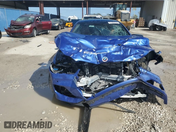 2023 BMW 8 Series M850i z VIN WBAGV8C08PCK41272, wystawiony jako Copart lot #77442574 z przebiegiem Nie podano mil oraz Szkoda całkowita • Salvage title. Historia ofert i sprzedaży dostępna na DreamBid. Obrazek 5.