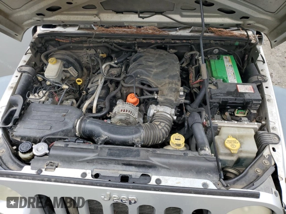 2012 Jeep Wrangler Unlimited Sport RHD with VIN 1C4BJWKG3CL220996, listed as a Copart auction lot 87860055 with 175,725 mi miles and Clean title. Bid and sale history available at DreamBid. Image 11.