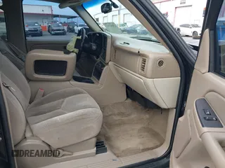 2005 Chevrolet Tahoe Z71 with VIN 1GNEC13TX5R145310, listed as a IAAI auction lot 42056793 with 159,002 mi miles and . Bid and sale history available at DreamBid. Image 5.