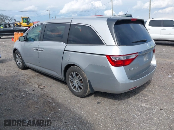 2012 Honda Odyssey EX-L with VIN 5FNRL5H68CB131431, listed as a IAAI auction lot 42012749 with 245,649 mi miles and . Bid and sale history available at carsss.com. Image 3.