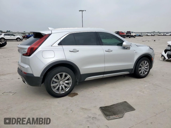 2020 Cadillac XT4 FWD Premium Luxury z VIN 1GYFZCR42LF115413, wystawiony jako Copart lot #56746785 z przebiegiem 41 296 mil mil oraz Szkody całkowita. Historia ofert i sprzedaży dostępna na DreamBid. Obrazek 3.