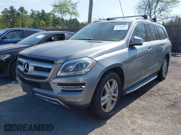 2014 Mercedes-Benz GL 450 with VIN 4JGDF7CE0EA290673, listed as a IAAI auction lot 42207889 with 132,251 mi miles and . Bid and sale history available at DreamBid. Image 2.