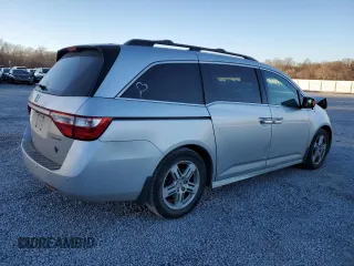 2012 Honda Odyssey Touring with VIN 5FNRL5H9XCB027758, listed as a Copart auction lot 86058504 with 164,860 mi miles and Salvage Title. Bid and sale history available at DreamBid. Image 3.
