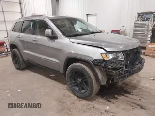 2015 Jeep Grand Cherokee Laredo with VIN 1C4RJFAG4FC797069, listed as a IAAI auction lot 41435299 with 146,755 mi miles. Bid and sale history available at carsss.com. Image 1.