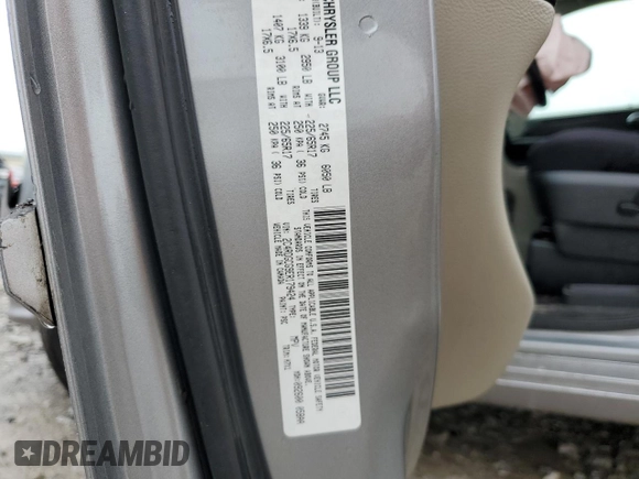 2014 Dodge Grand Caravan SXT z VIN 2C4RDGCG9ER179424, wystawiony jako Copart lot #58532245 z przebiegiem 193 409 mil mil oraz Szkoda całkowita • Salvage title. Historia ofert i sprzedaży dostępna na DreamBid. Obrazek 13.