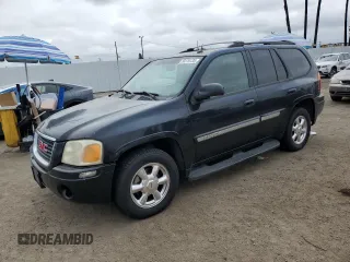 2004 GMC Envoy SLE with VIN 1GKDT13S442155788, listed as a Copart auction lot 50270135 with 164,271 mi miles and Salvage Title. Bid and sale history available at carsss.com. Image 1.