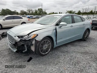 2013 Ford Fusion SE Hybrid z VIN 3FA6P0LU6DR174719, wystawiony jako Copart lot #62877715 z przebiegiem 52 884 mil mil oraz Szkoda całkowita • Salvage title. Historia ofert i sprzedaży dostępna na DreamBid. Obrazek 1.