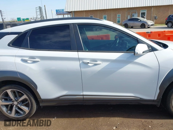 2019 Hyundai Kona Ultimate with VIN KM8K53A53KU373496, listed as a IAAI auction lot 42009405 with 69,206 mi miles and . Bid and sale history available at carsss.com. Image 13.