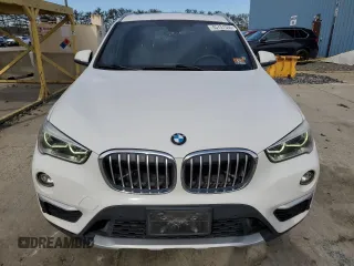 2016 BMW X1 xDrive28i with VIN WBXHT3C31GP884424, listed as a Copart auction lot 45737555 with 132,959 mi miles and Clean Title. Bid and sale history available at carsss.com. Image 5.