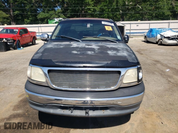 2001 Ford F-150 XLT with VIN 1FTRW07L81KE00951, listed as a Copart auction lot 57348535 with Not provided miles and Salvage title. Bid and sale history available at DreamBid. Image 5.