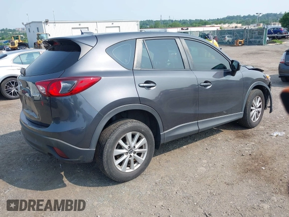 2016 Mazda CX-5 Sport with VIN JM3KE4BY7G0893984, listed as a IAAI auction lot 42479813 with Not provided miles and . Bid and sale history available at DreamBid. Image 4.