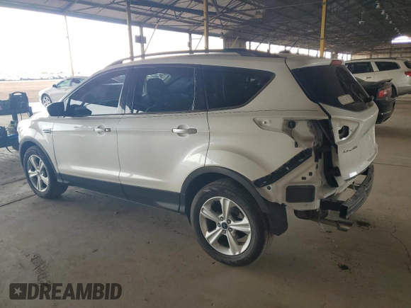 2015 Ford Escape SE with VIN 1FMCU9GX2FUB49175, listed as a Copart auction lot 54582125 with 90,544 mi miles and Salvage Title. Bid and sale history available at DreamBid. Image 2.