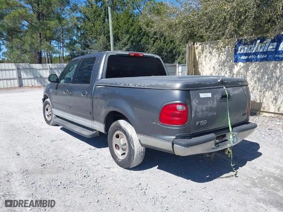 2002 Ford F-150 XLT with VIN 1FTRW07642KC65138, listed as a IAAI auction lot 41739516 with 354,140 mi miles. Bid and sale history available at carsss.com. Image 3.