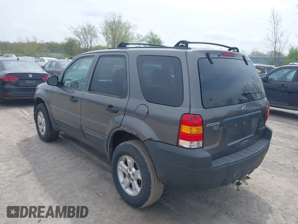 2005 Ford Escape XLT with VIN 1FMYU03115KB16214, listed as a IAAI auction lot 42113350 with 79,355 mi miles and . Bid and sale history available at DreamBid. Image 3.