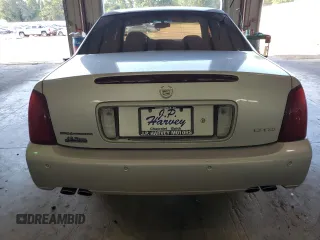 2002 Cadillac DeVille DTS with VIN 1G6KF57952U303332, listed as a Copart auction lot 61852523 with 173,500 mi miles and Clean Title. Bid and sale history available at carsss.com. Image 6.