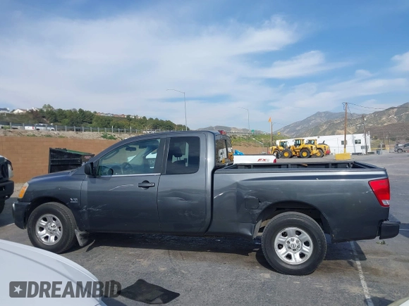 2004 Nissan Titan SE with VIN 1N6AA06A04N567056, listed as a IAAI auction lot 42044609 with 122,174 mi miles. Bid and sale history available at carsss.com. Image 14.