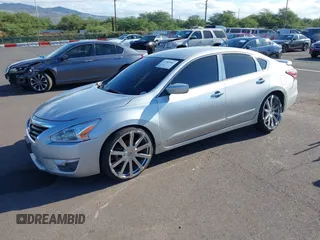2014 Nissan Altima S with VIN 1N4AL3AP8EN343583, listed as a IAAI auction lot 41989981 with 103,012 mi miles and . Bid and sale history available at DreamBid. Image 2.