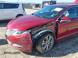 2015 Lincoln MKZ z VIN 3LN6L2G9XFR618075, wystawiony jako IAAI lot #41469247 z przebiegiem 152 966 mil mil oraz . Historia ofert i sprzedaży dostępna na DreamBid. Obrazek 6.