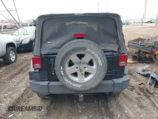 2011 Jeep Wrangler Sport with VIN 1J4AA2D18BL588273, listed as a IAAI auction lot 41857858 with 136,473 mi miles and . Bid and sale history available at carsss.com. Image 16.