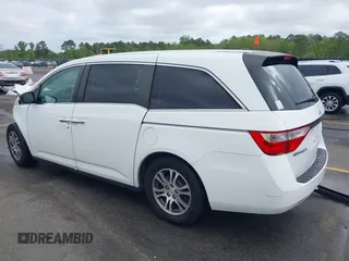 2012 Honda Odyssey EX-L with VIN 5FNRL5H60CB134954, listed as a IAAI auction lot 41942488 with 192,069 mi miles and . Bid and sale history available at DreamBid. Image 3.