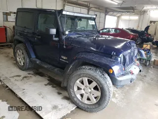 2013 Jeep Wrangler Sahara z VIN 1C4AJWBG4DL504800, wystawiony jako Copart lot #60504575 z przebiegiem 166 687 mil mil oraz Szkoda całkowita • Salvage title. Historia ofert i sprzedaży dostępna na DreamBid. Obrazek 4.