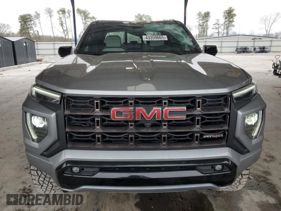 2024 GMC Canyon 4WD AT4X with VIN 1GTP6EEK1R1158021, listed as a Copart auction lot 43359665 with 14,120 mi miles and Salvage Title. Bid and sale history available at carsss.com. Image 5.