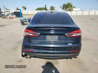 2020 Ford Fusion SE z VIN 3FA6P0HD4LR114834, wystawiony jako Copart lot #60224845 z przebiegiem 84 110 mil mil oraz Szkoda całkowita • Salvage title. Historia ofert i sprzedaży dostępna na DreamBid. Obrazek 6.