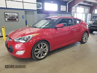 2015 Hyundai Veloster z VIN KMHTC6AD4FU222904, wystawiony jako Copart lot #60853105 z przebiegiem 133 289 mil mil oraz Czysty tytuł • Clean title. Historia ofert i sprzedaży dostępna na DreamBid. Obrazek 1.