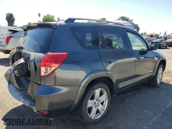 2007 Toyota RAV4 Sport z VIN JTMZK32V076009221, wystawiony jako Copart lot #75331574 z przebiegiem 214 017 mil mil oraz Szkoda całkowita • Salvage title. Historia ofert i sprzedaży dostępna na DreamBid. Obrazek 3.