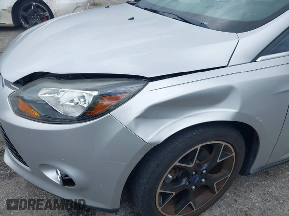 2012 Ford Focus Titanium с VIN 1FAHP3J28CL381248, выставлен на аукционе IAAI как лот 39731691 с пробегом 123 720 миль миль и . История ставок и продаж доступна на DreamBid. Изображение 13.
