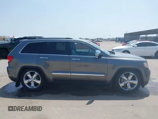 2013 Jeep Grand Cherokee Overland with VIN 1C4RJFCG2DC611877, listed as a IAAI auction lot 41910800 with 151,457 mi miles. Bid and sale history available at carsss.com. Image 13.