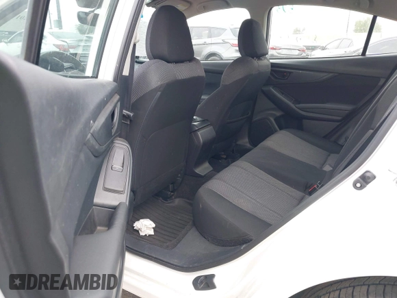 2021 Subaru Impreza Premium with VIN 4S3GKAV61M3604298, listed as a IAAI auction lot 42011198 with 50,667 mi miles and . Bid and sale history available at DreamBid. Image 8.