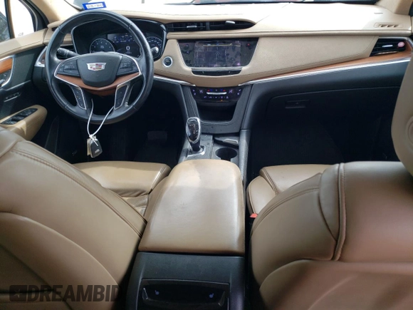 2017 Cadillac XT5 Platinum AWD z VIN 1GYKNFRS1HZ283589, wystawiony jako Copart lot #49140565 z przebiegiem 77 900 mil mil oraz Szkoda całkowita • Salvage title. Historia ofert i sprzedaży dostępna na DreamBid. Obrazek 8.